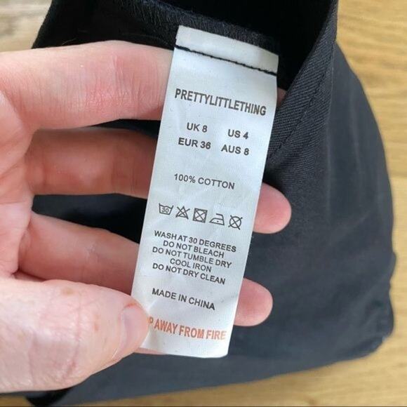 Pretty Little Thing Bandeau Zip Front Crop Top in Black - Picture 3 of 4